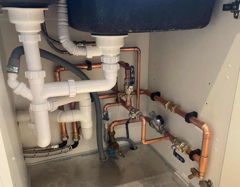Kitchen under sink re-plumb